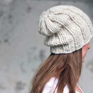 model wearing a chunky hand knit hat
