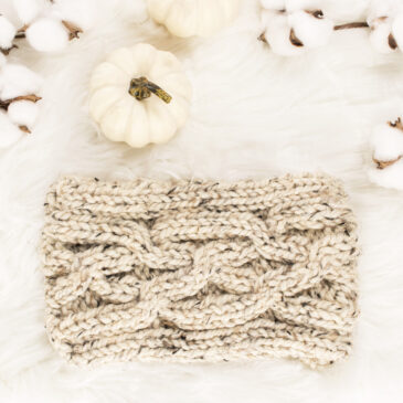 wide boho cable headband knitting pattern on a fur blanket