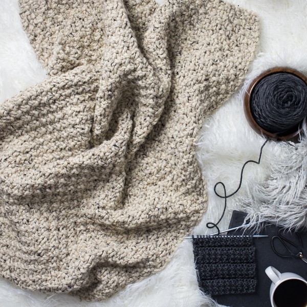 knit blanket on a rug