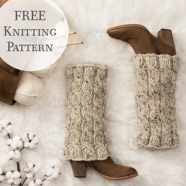 chunky cable knit leg warmers over boots on a fur blanket