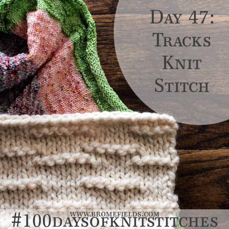 knitted swatch on a wood table