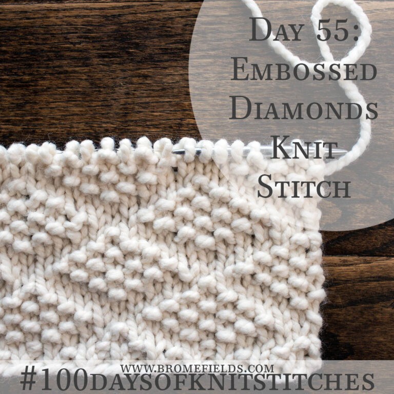 knitted swatch on a wood table
