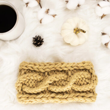 french braid knit headband on a fur blanket with pumpkins & a coffee