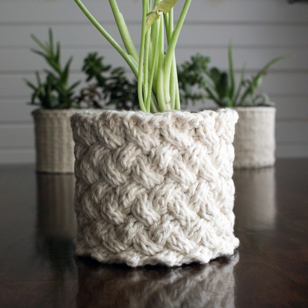 Lattice Planter Knitting Pattern on a wood table.