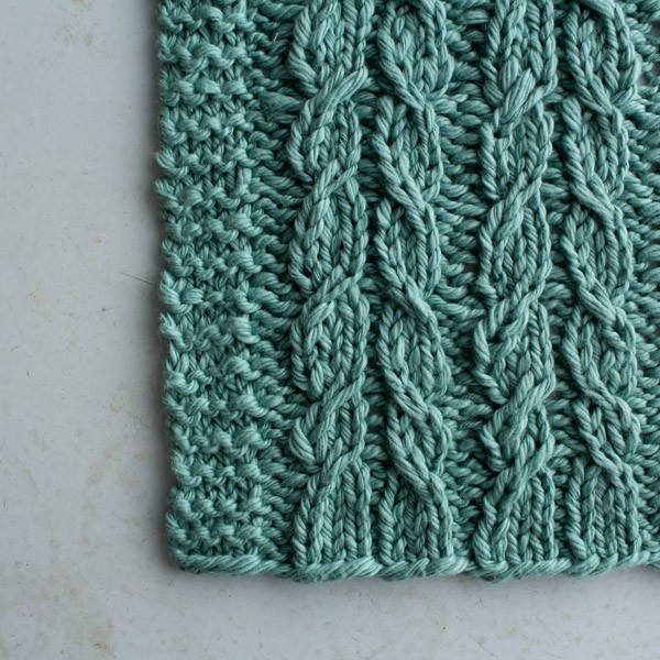 knit washcloth on a table