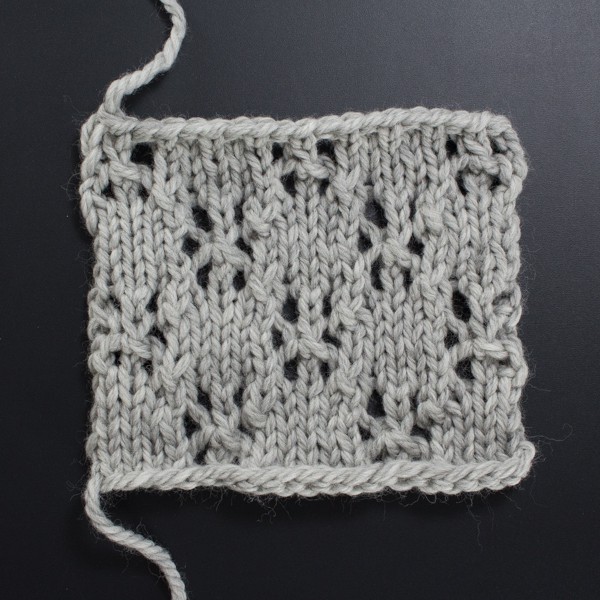 Swatch of the Front Side of the Lacy Stars Lace Knit Stitch