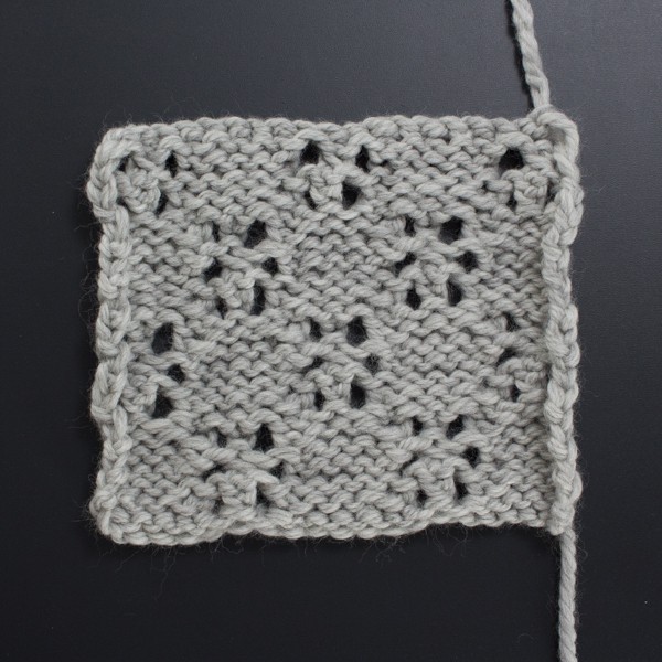 Swatch of the Back Side of the Lacy Stars Lace Knit Stitch