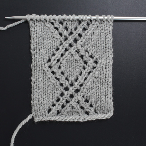Swatch of the Front Side of the Double Eyelet Twist Lace Knit Stitch