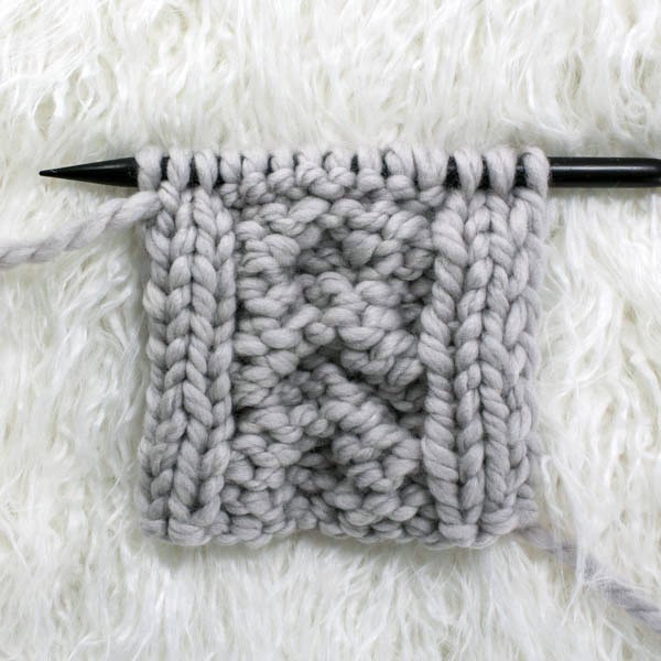 back side of swatch of cable knit stitch