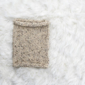 knit cowl on a fur blanket