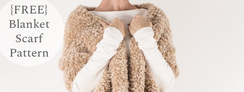 model wearing knit blanket scarf