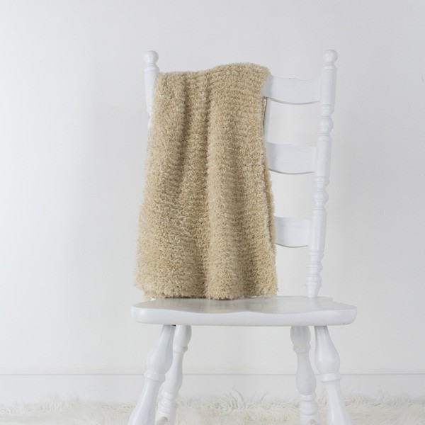knit scarf draped over a chair