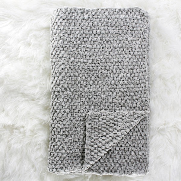 knit scarf on a rug