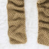 knit scarf on a rug