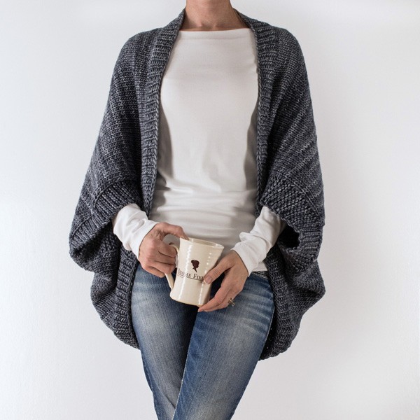 model wearing a hand knit shrug sweater
