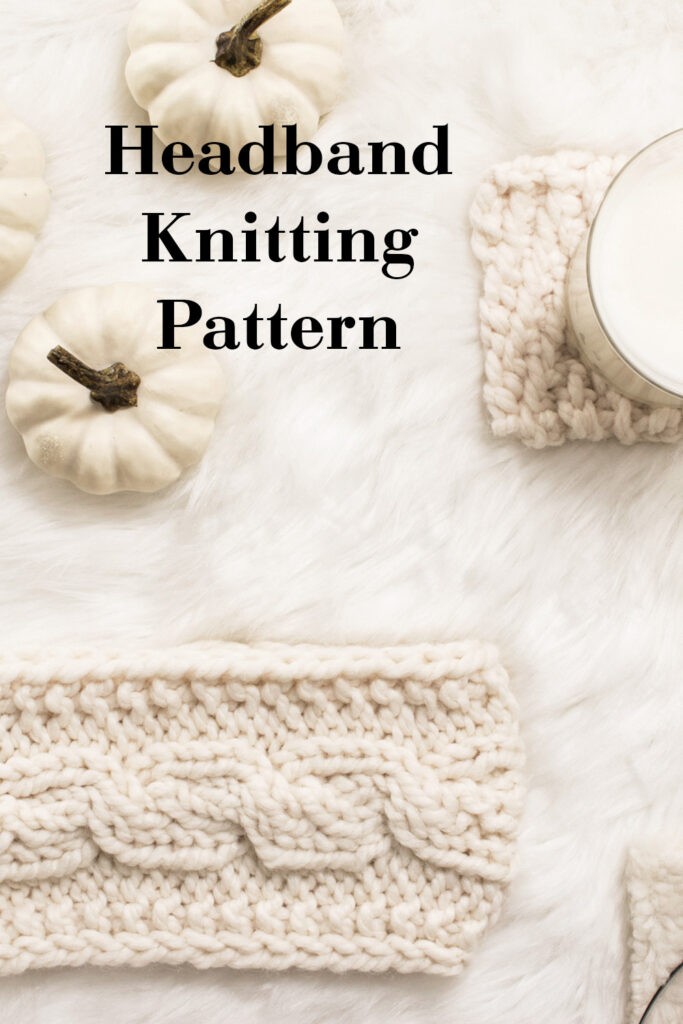 cable knit headband on a fur blanket with pumpkins & a candle