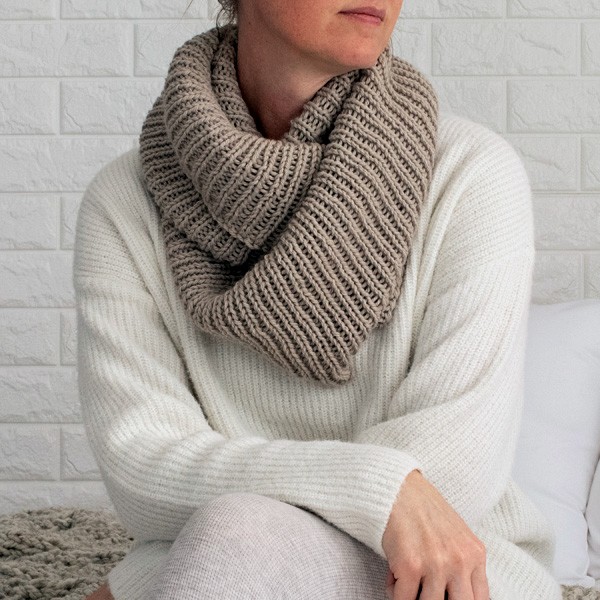 model wearing an infinity scarf wrapped twice around her neck.
