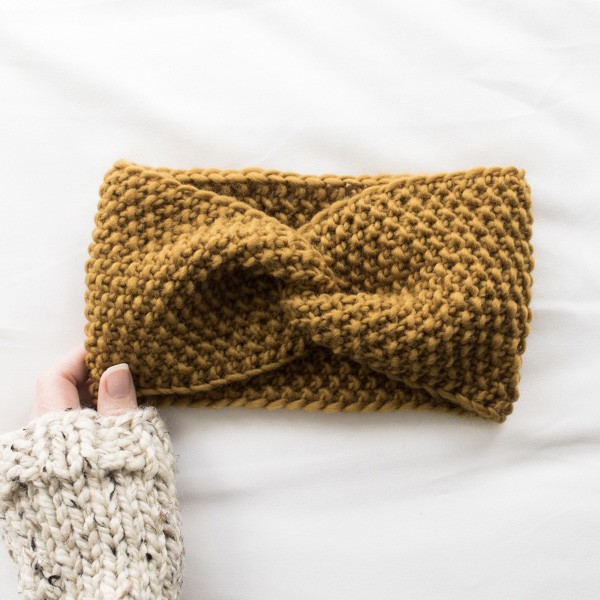 knitted headband on a white blanket
