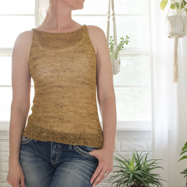 Photo of a summer knit tank top on a model.