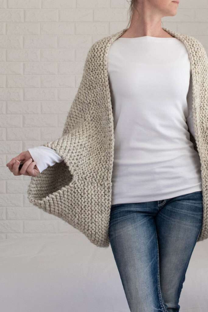 model wearing a chunky oversized shrug