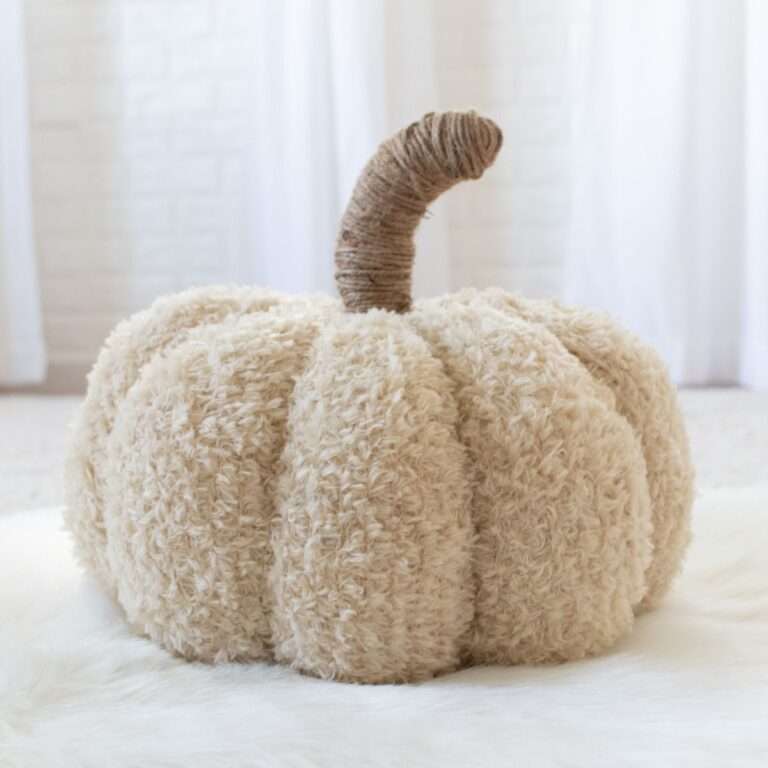 large knit pumpkin with a twine stem