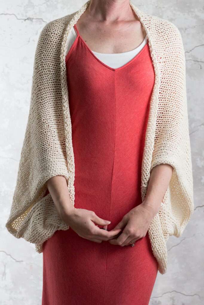 model wearing a handknit cotton shrug