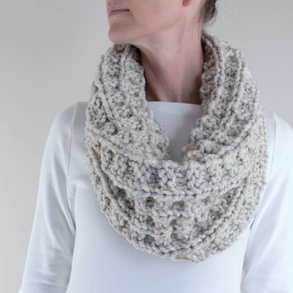 cozy hand knitted cowl on a model
