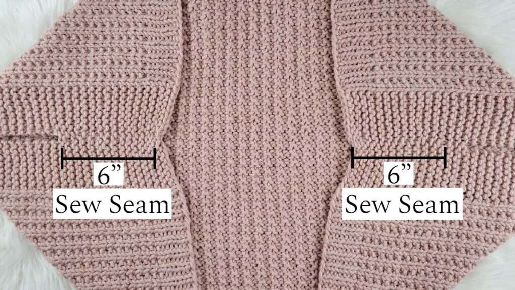 diagram of where to seam for the sleeves on the knitted shrug