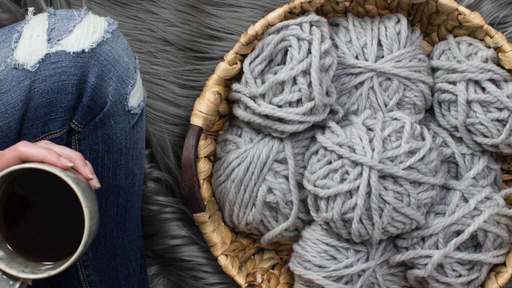 cozy setting of lots of partial balls of yarn