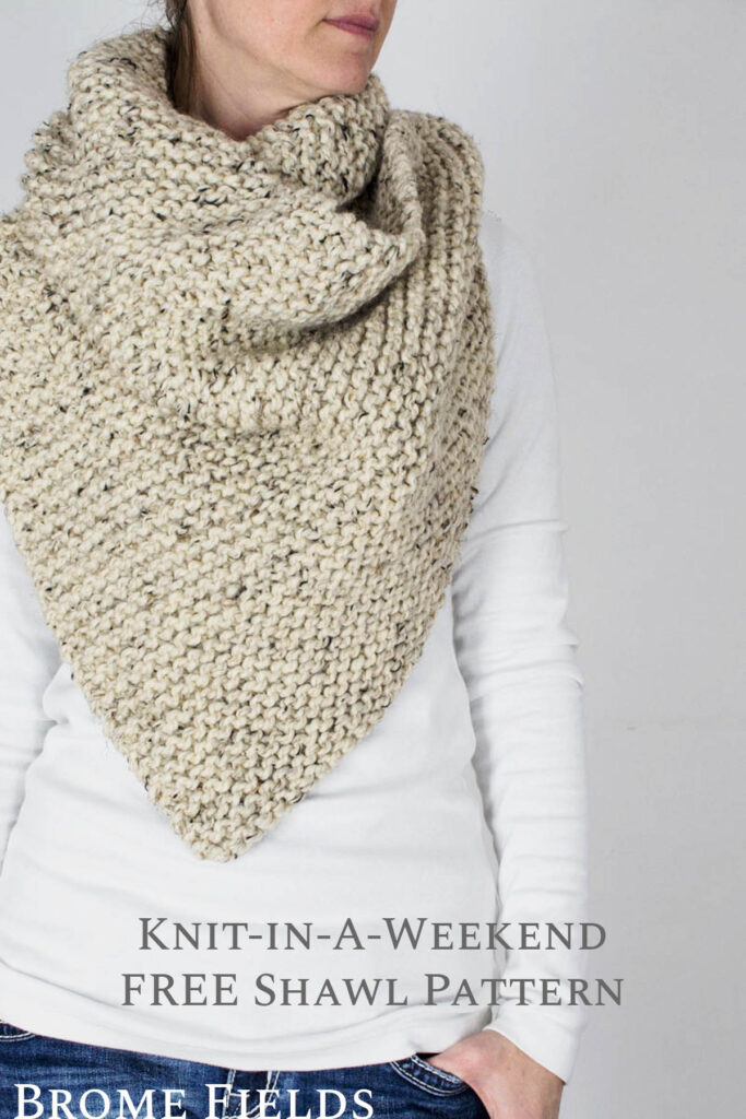 model wearing a chunky knit shawl