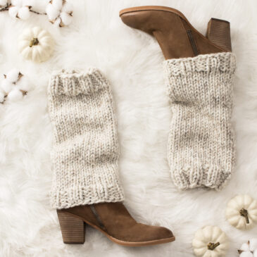 modern knit leg warmers on a faux fur blanket in a cozy setting