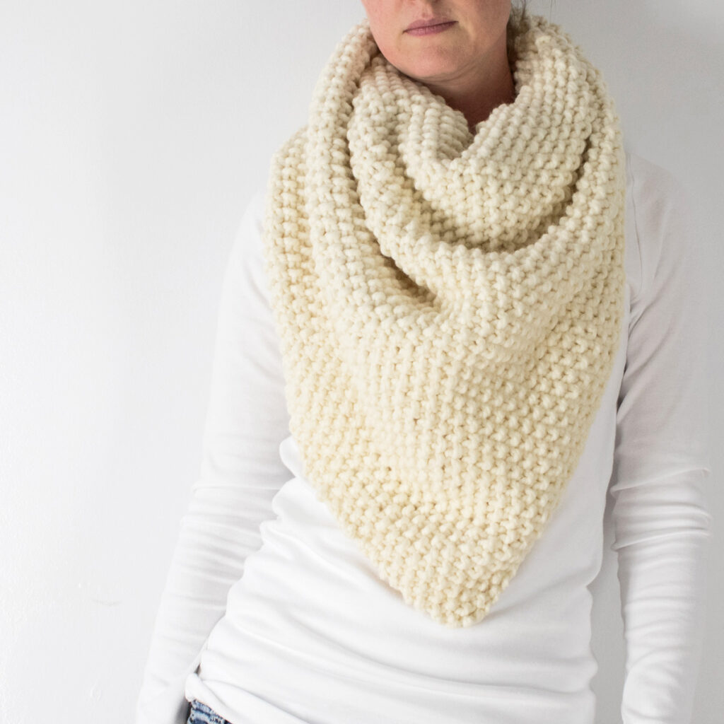 model wearing a chunky knit shawl