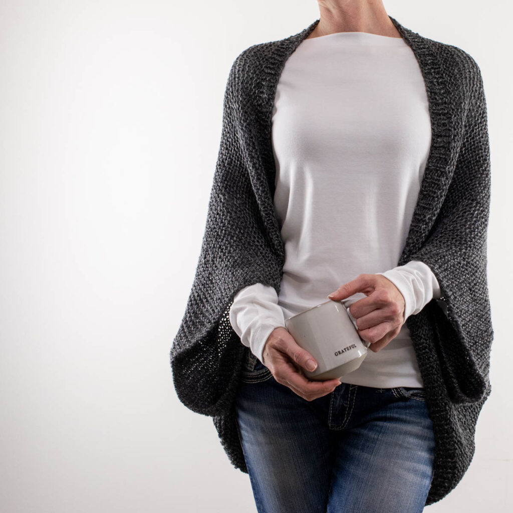 cozy knitted shrug on a model