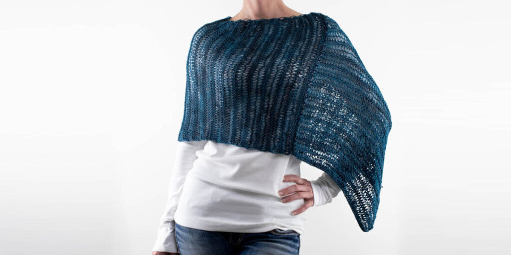 garter stitch knitted poncho on a model