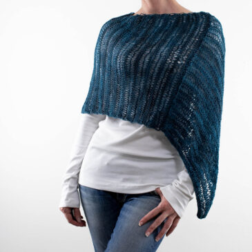 garter stitch knitted poncho on a model