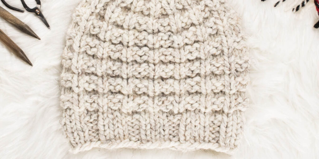 up-close pic of a hand knit chunky hat