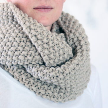hand knit chunky seed stitch cowl on a model