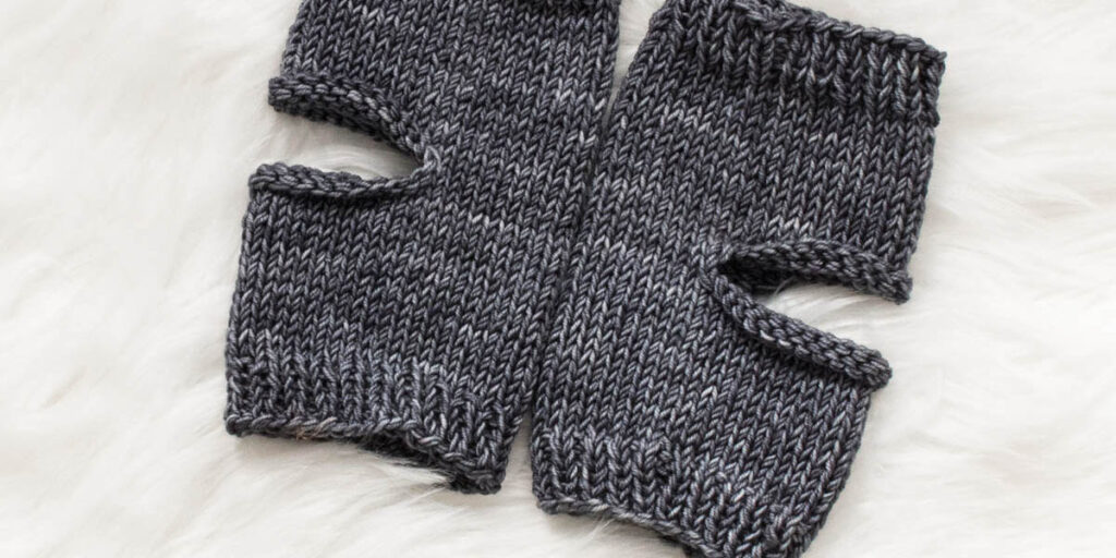 Finished yoga socks displayed on a faux fur blanket