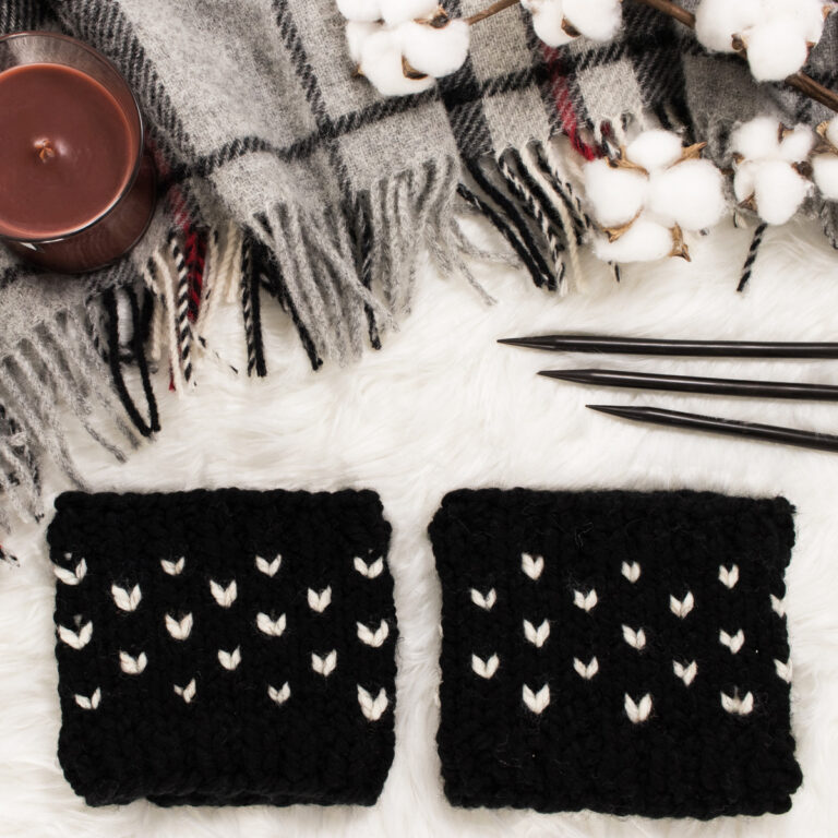 fair isle boot cuffs laying on a faux fur blanket