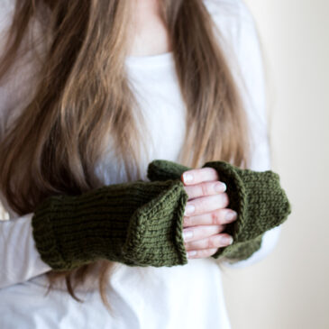 knit fingerless gloves mittens on a model