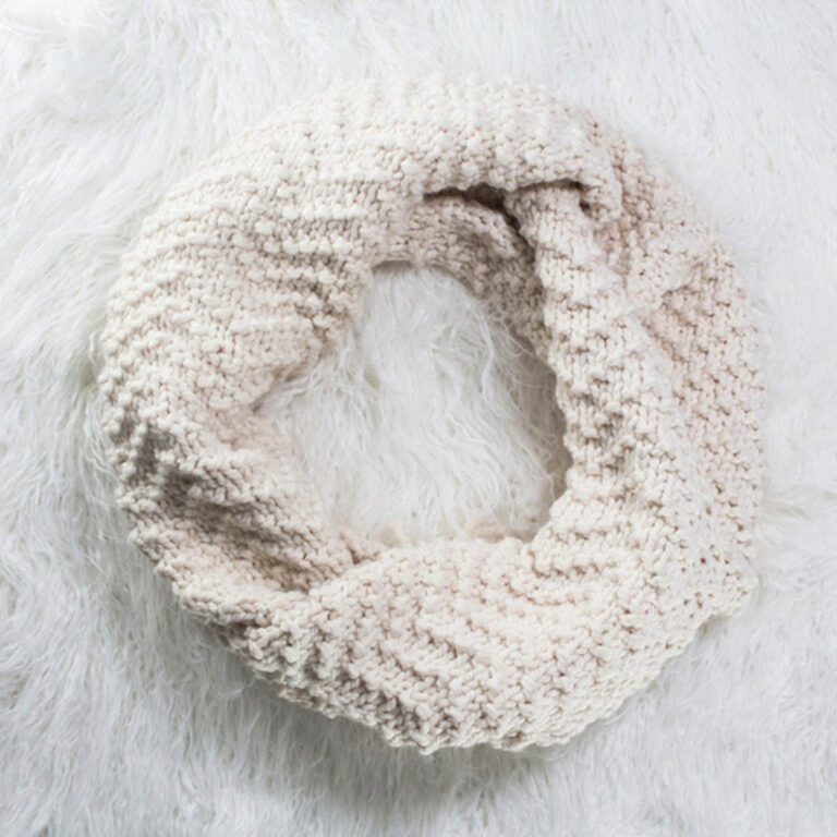Chevron cowl laying on a faux fur blanket