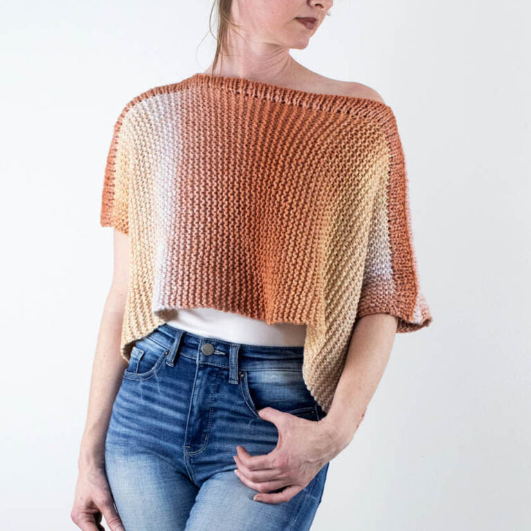 model wearing an easy poncho knitted in the garter stitch