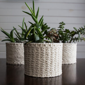 pic of a jute stitch knitted plant pot cover