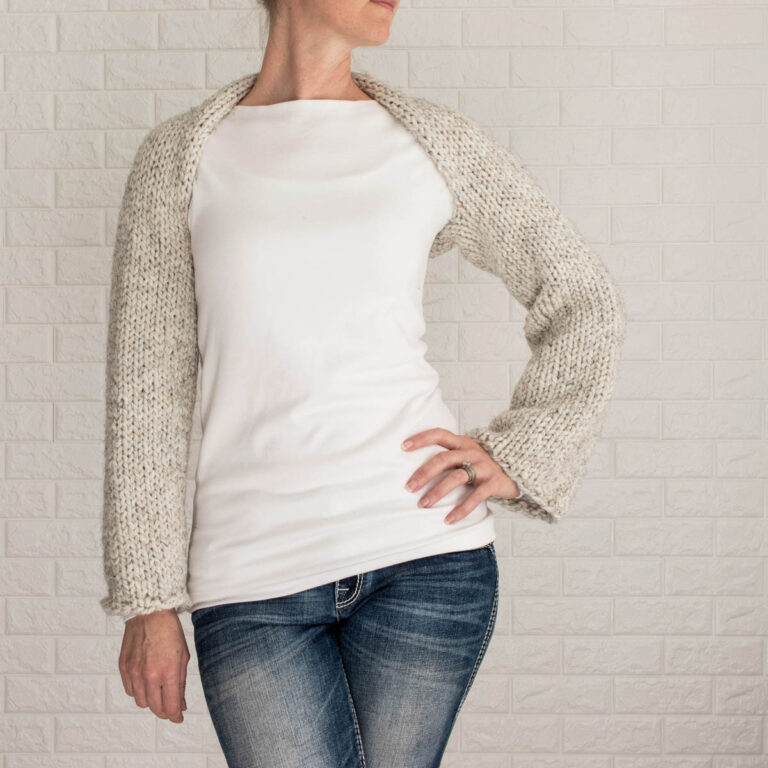 model wearing an easy Shrug Sweater Crop Top knitted in the stockinette stitch without seams