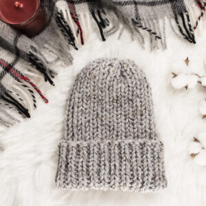 ribbed knit hat displayed on faux fur blanket