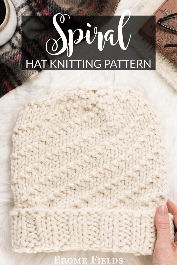 spiral knit hat displayed on faux fur blanket