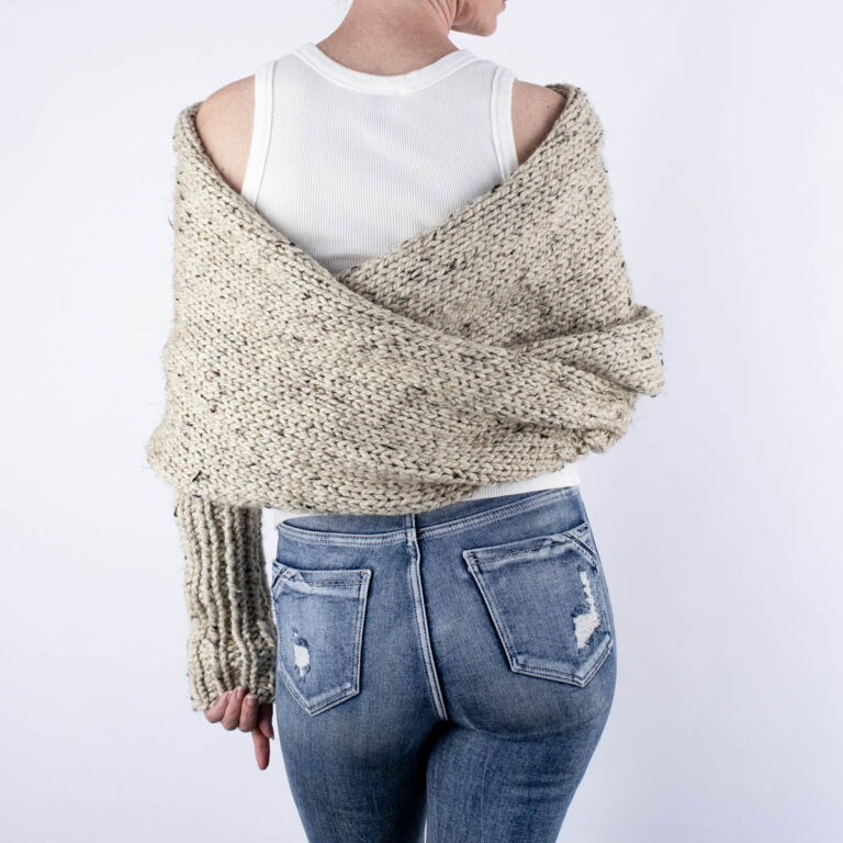 pic of a Sweater Scarf with Sleeves on a model