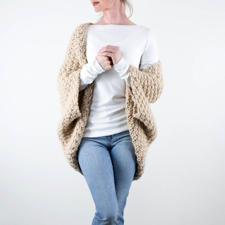 pic of a model wearing a knitted shrug