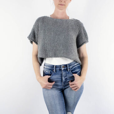 hand knitted crop top sweater on a model