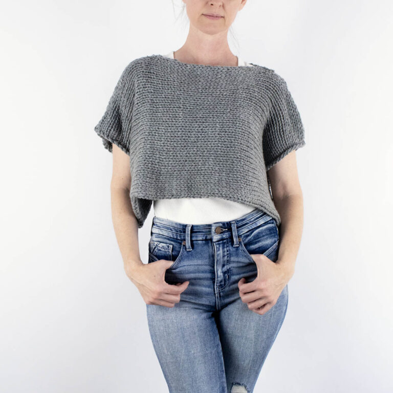 hand knitted crop top sweater on a model